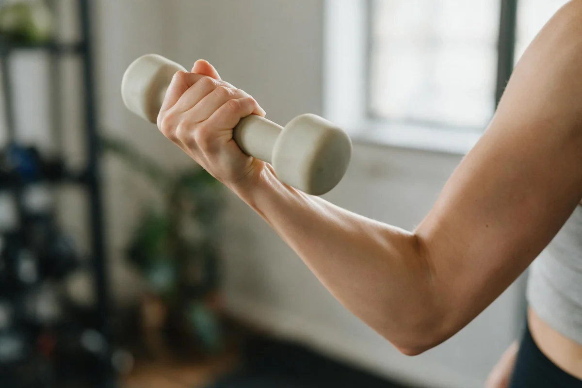 Woman over 50 doing a resistance band row exercise